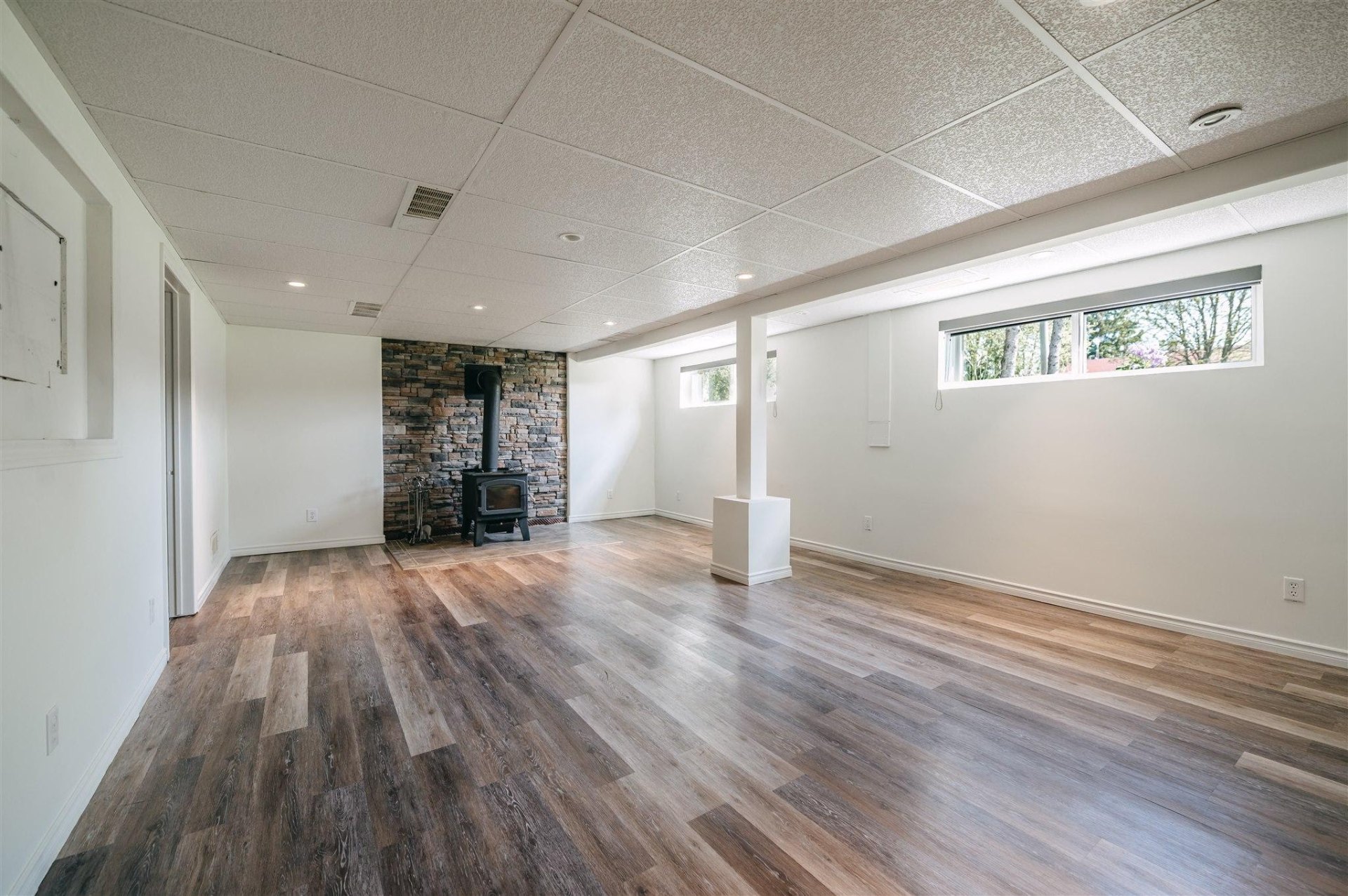 Finished lower level with woodstove fireplace at 1115 Jarvis Avenue